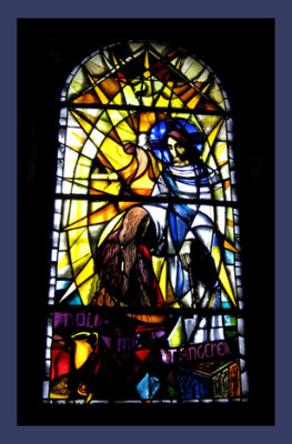 stained glass depicting Mary at the tomb